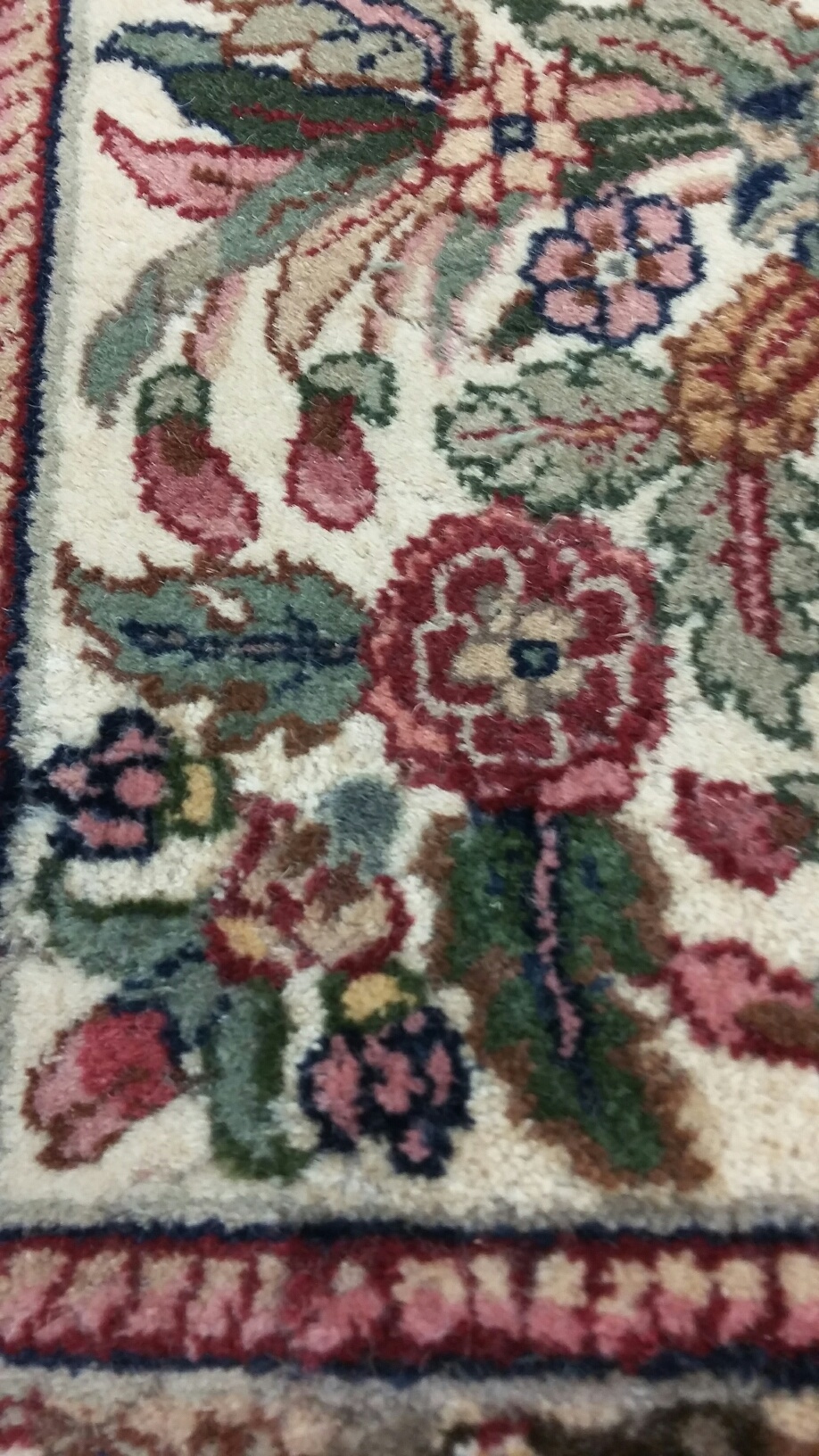 moth damaged rug after