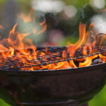 Open grill with flames coming out of it